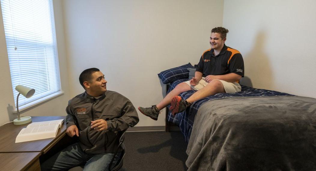 students in dorm room